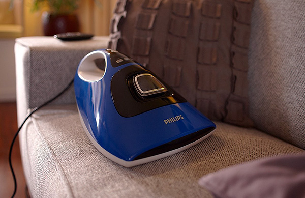 Ειδική ηλεκτρική σκούπα Philips για αποτελεσματική αφαίρεση των ακάρεων σκόνης από στρώματα, μαξιλάρια και χαλιά.